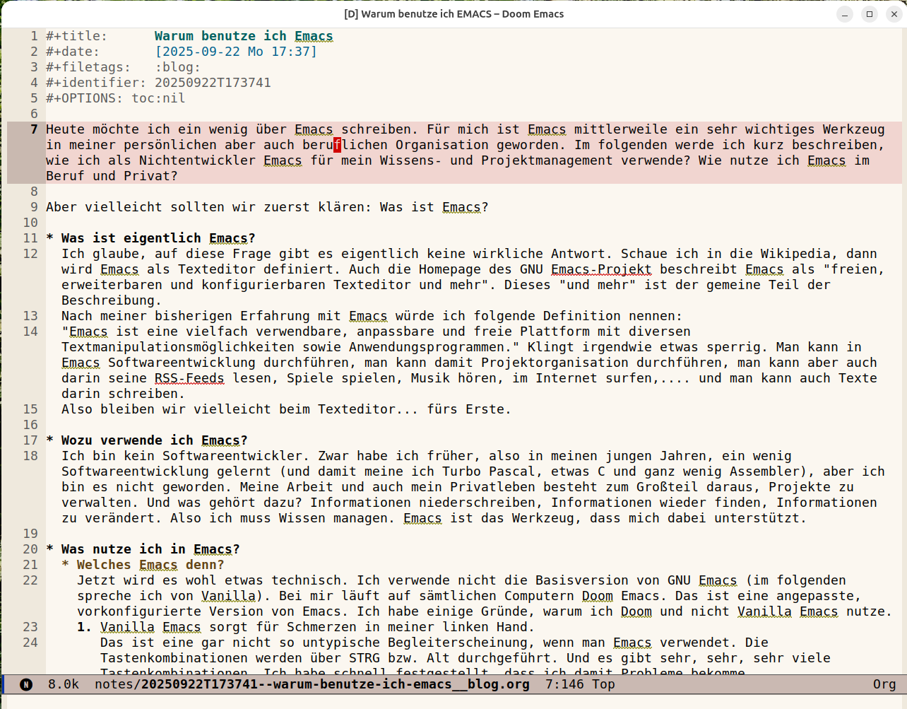 Auto-generated description: Ein Texteditor mit einem Artikel über die Verwendung von Emacs wird auf einem Bildschirm angezeigt.
